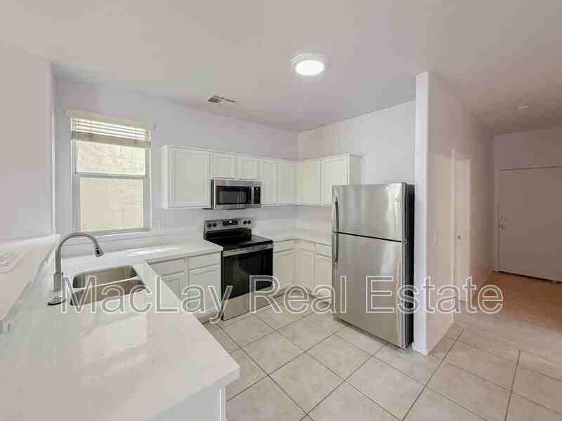 5216 W Albeniz Pl - Photo 5 of 29