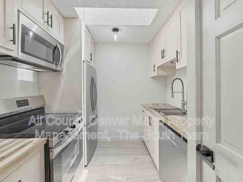 2835 S Monaco Street Pkwy #1-308 - Photo 4 of 15