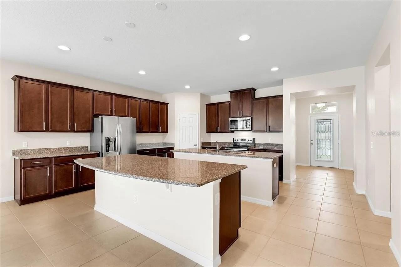 12201 Sawgrass Reserve Blvd - Photo 2 of 15