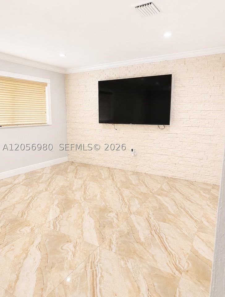 240 Tamiami Canal Rd - Photo 5 of 35