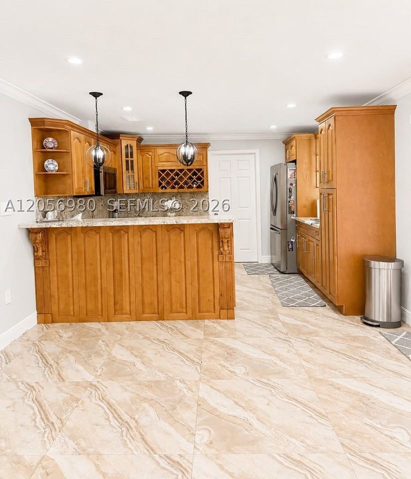 240 Tamiami Canal Rd - Photo 6 of 35
