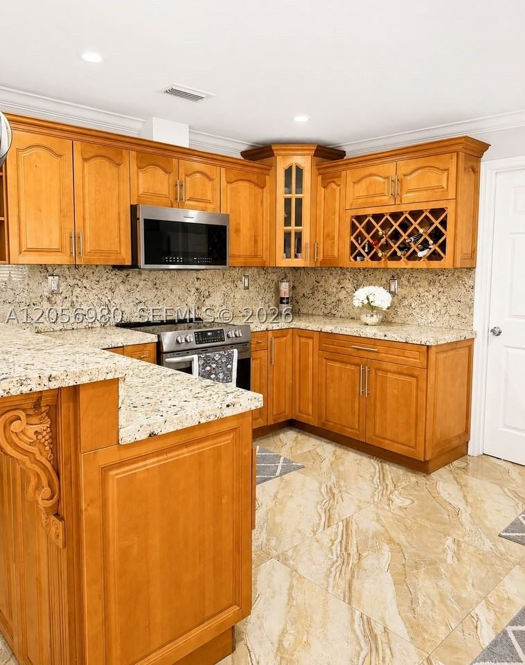 240 Tamiami Canal Rd - Photo 7 of 35