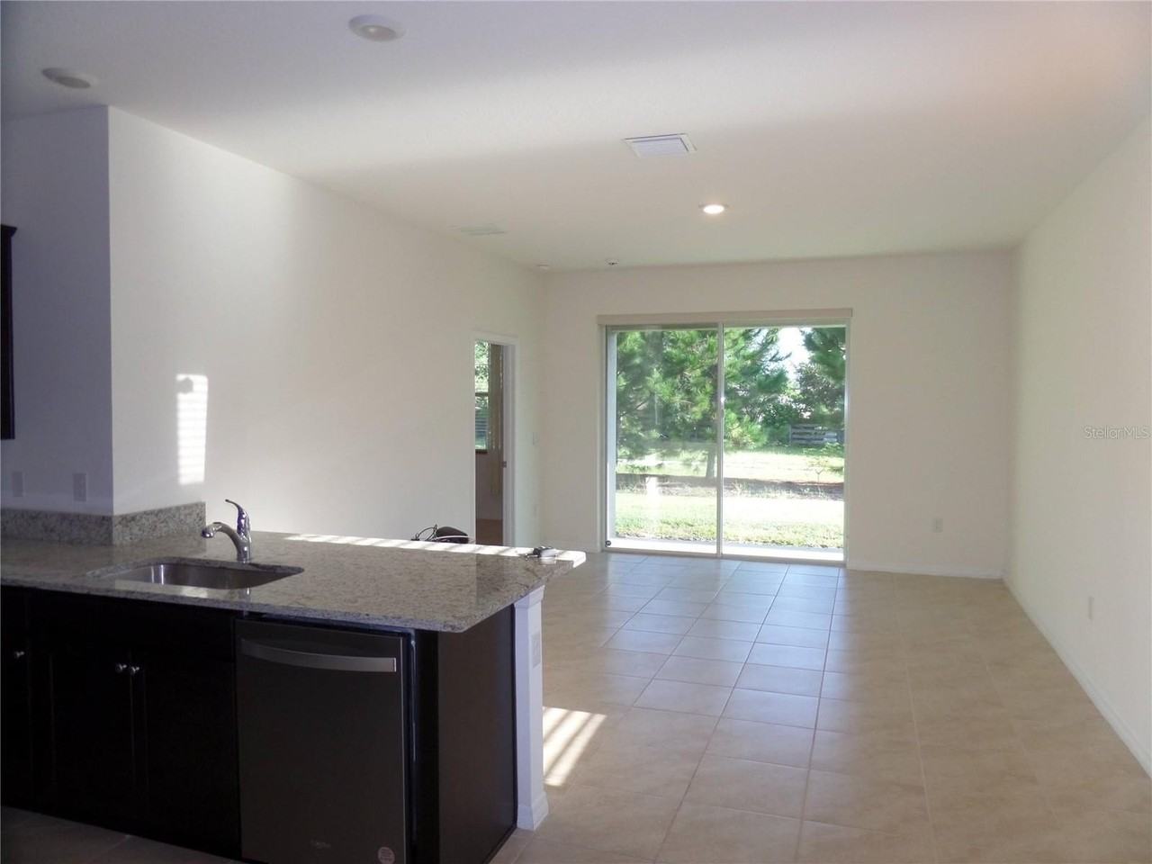 8051 Penrose Pl - Photo 5 of 50
