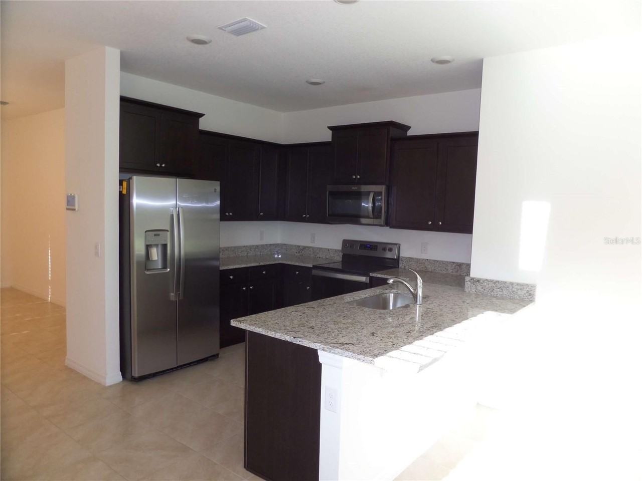 8051 Penrose Pl - Photo 7 of 50