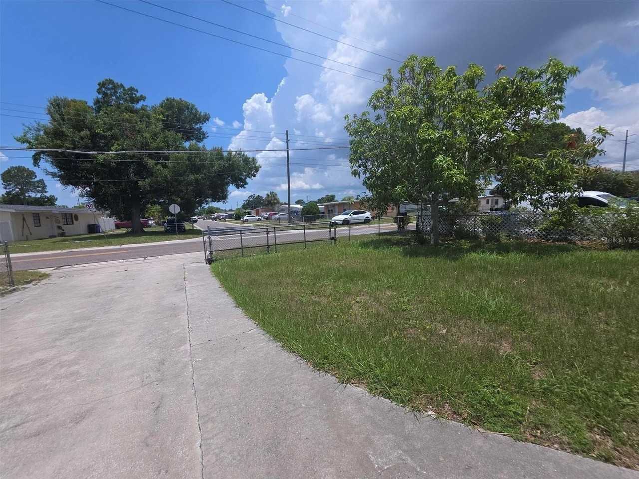 6015 N Manhattan Ave - Photo 2 of 3