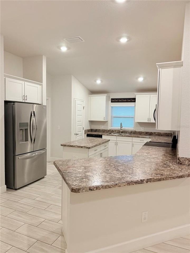 8797 Se 161st Pl - Photo 6 of 45