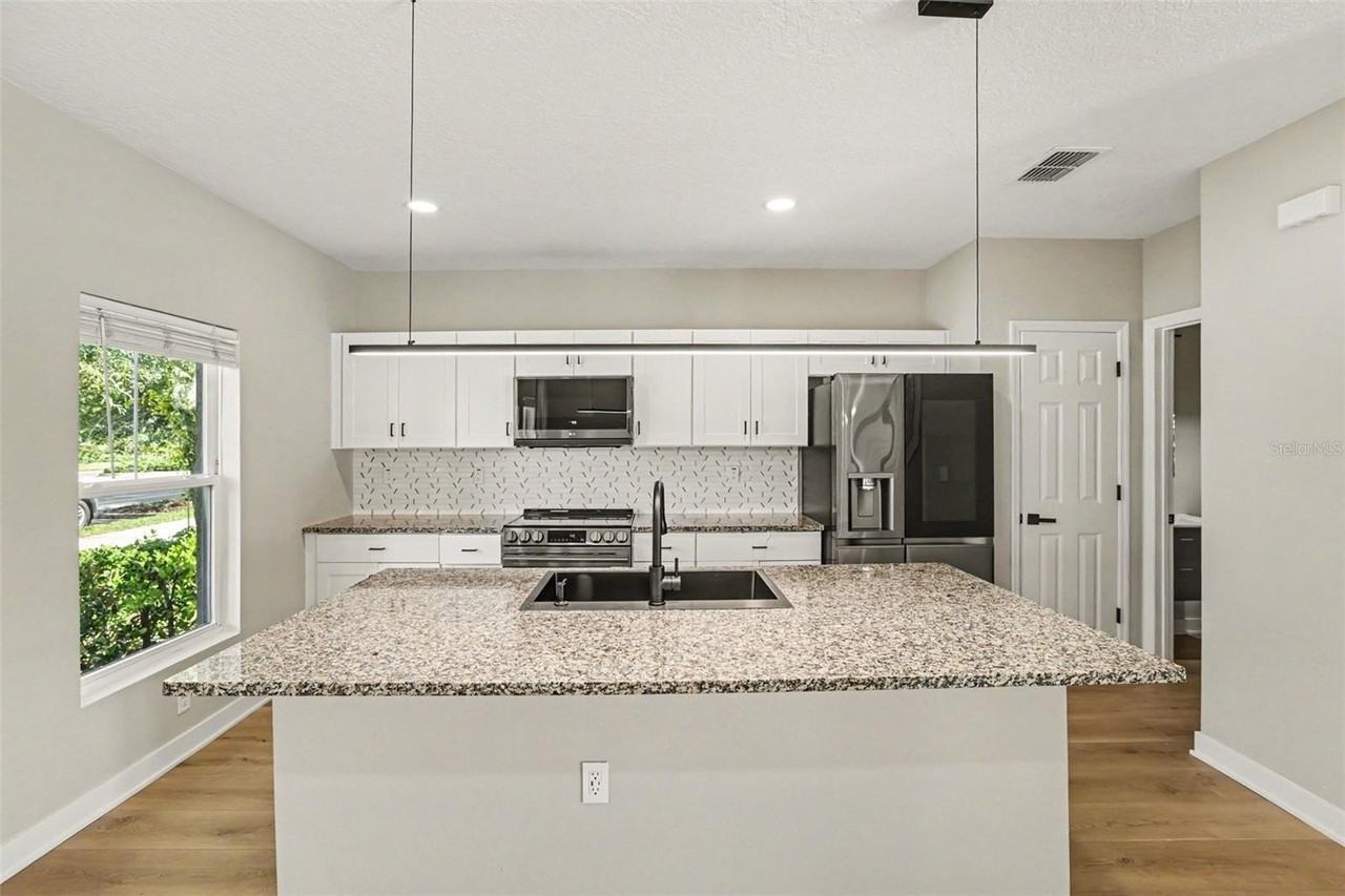 12531 Triple Creek Blvd - Photo 5 of 17