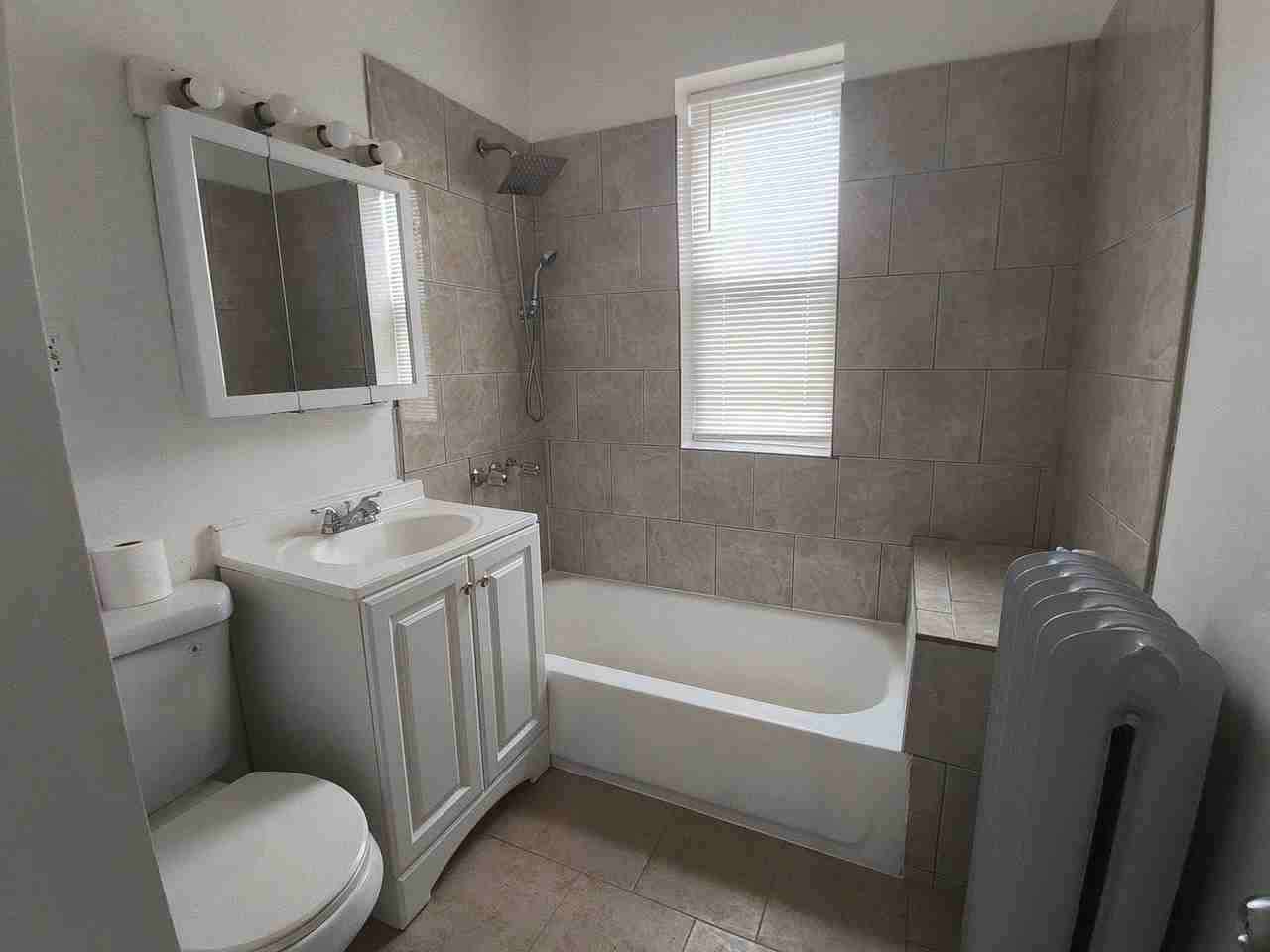 2542 W 64th St #1 - Photo 3 of 8