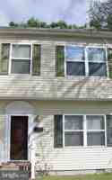 featured image of 106 E 2nd St