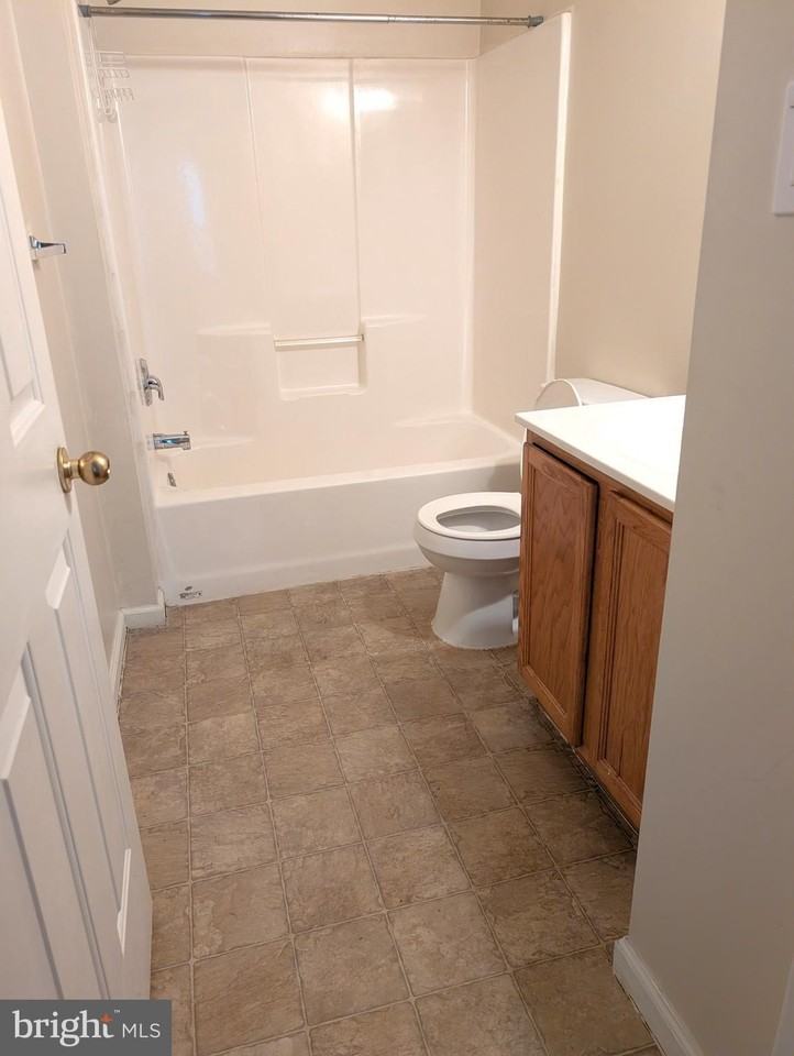 106 E 2nd St - Photo 5 of 10