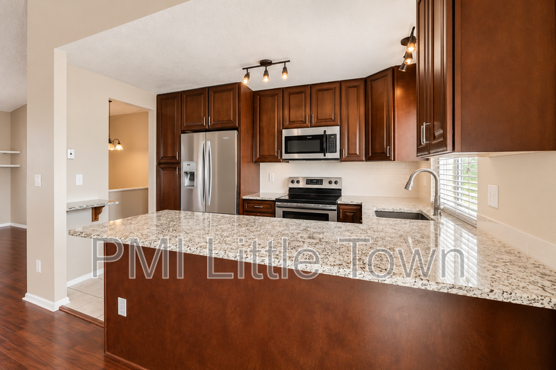 3145 S Gibralter St - Photo 6 of 26