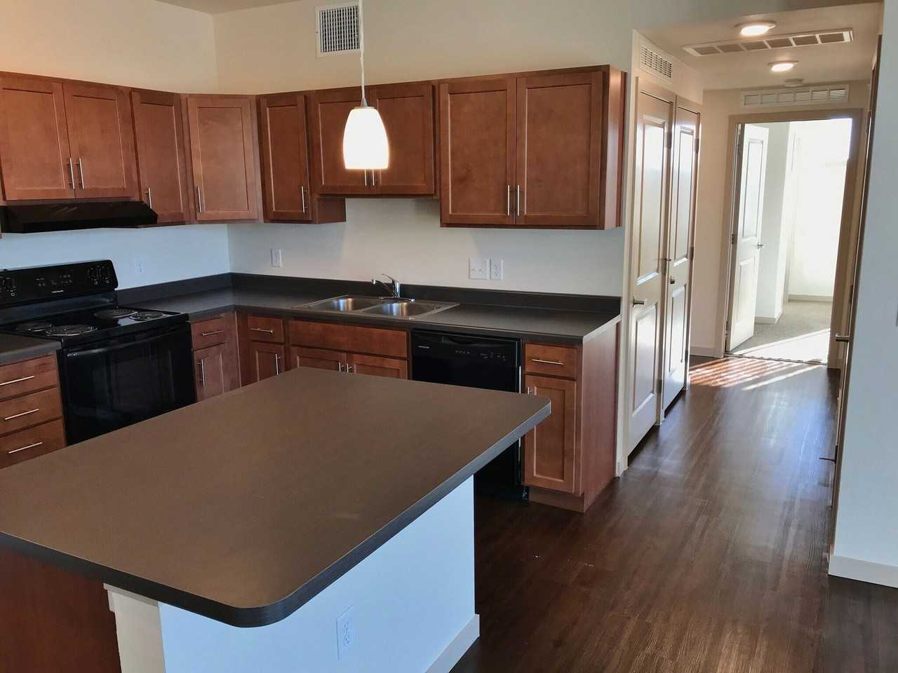 CRISMAN APARTMENTS - Photo 7 of 25