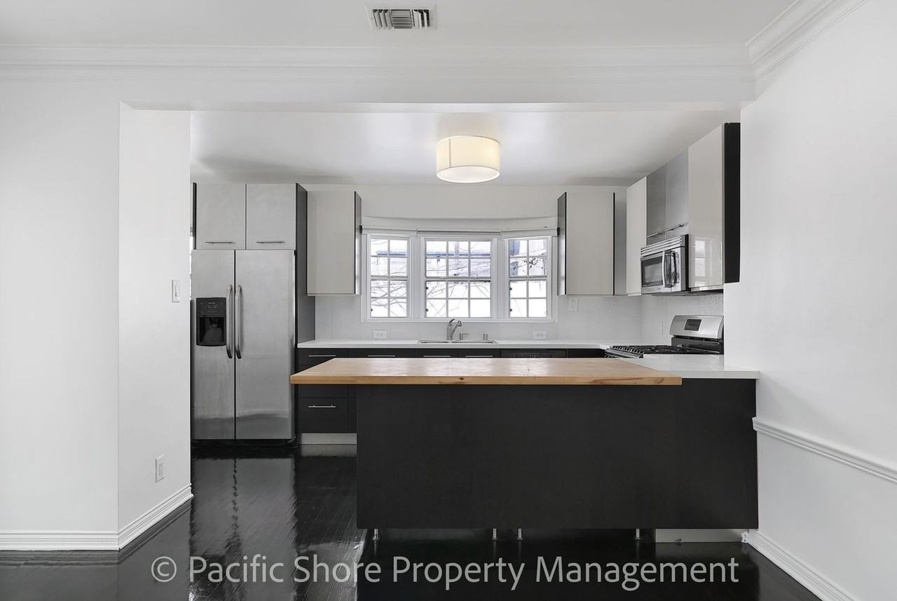 1521 S Curson Ave - Photo 5 of 16