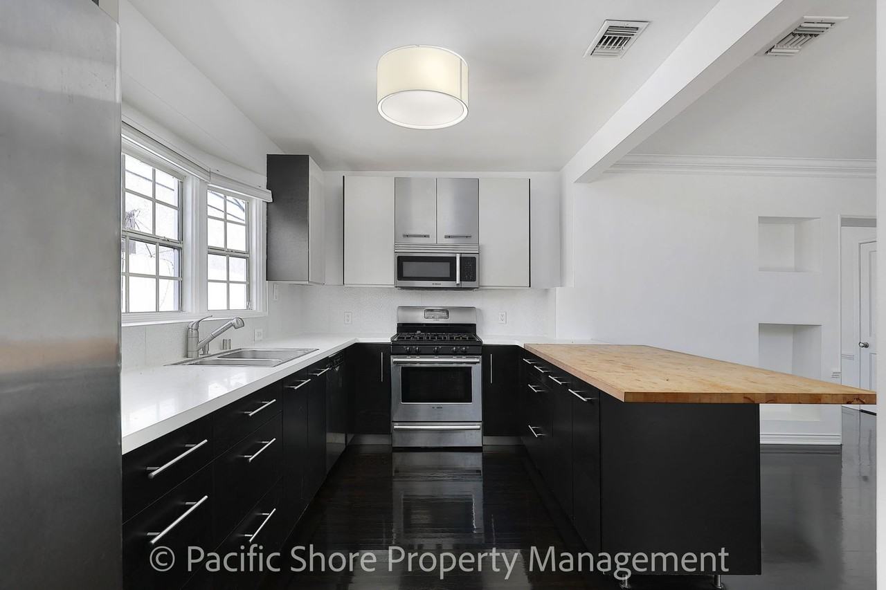 1521 S Curson Ave - Photo 6 of 16