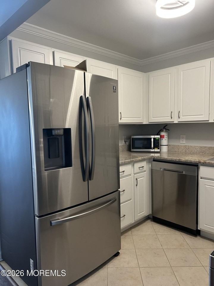 1187 Ocean Ave - Photo 5 of 11