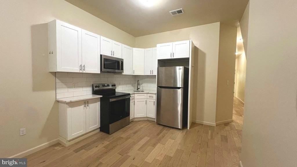 1219 W Silver St - Photo 2 of 13