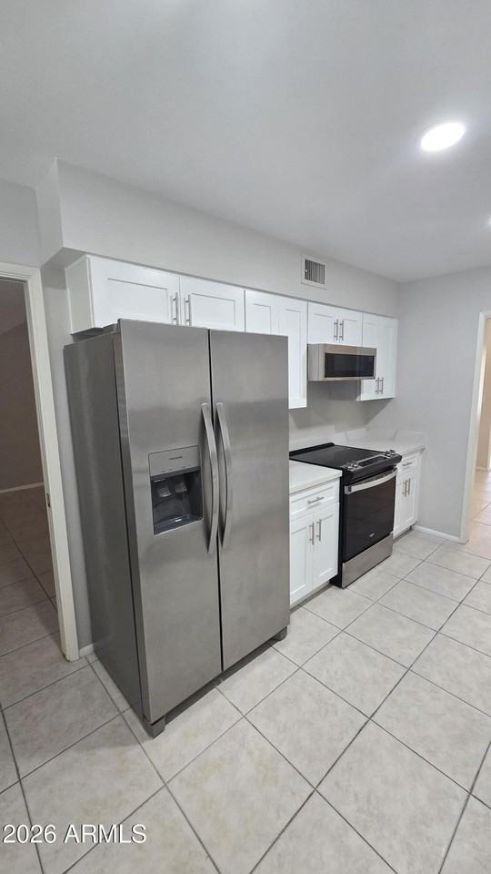 10715 W Tropicana Cir - Photo 5 of 31