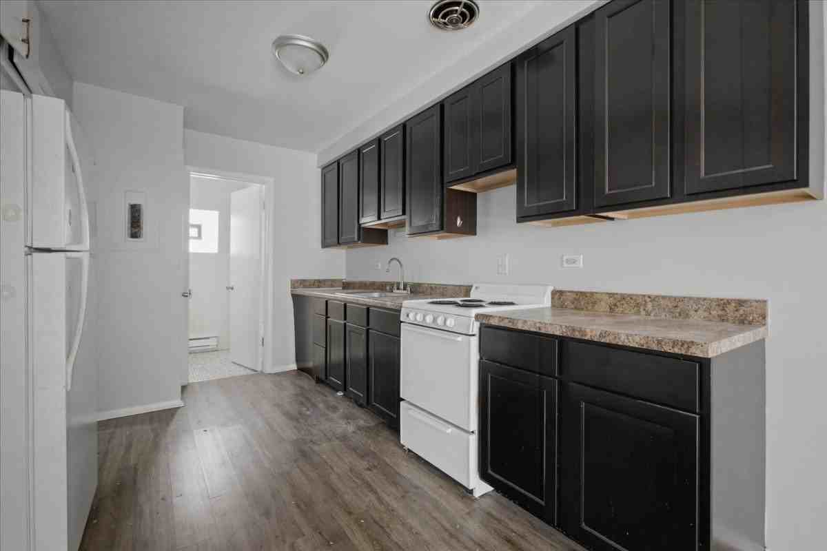 6212 W 64th Pl #201 - Photo 2 of 9