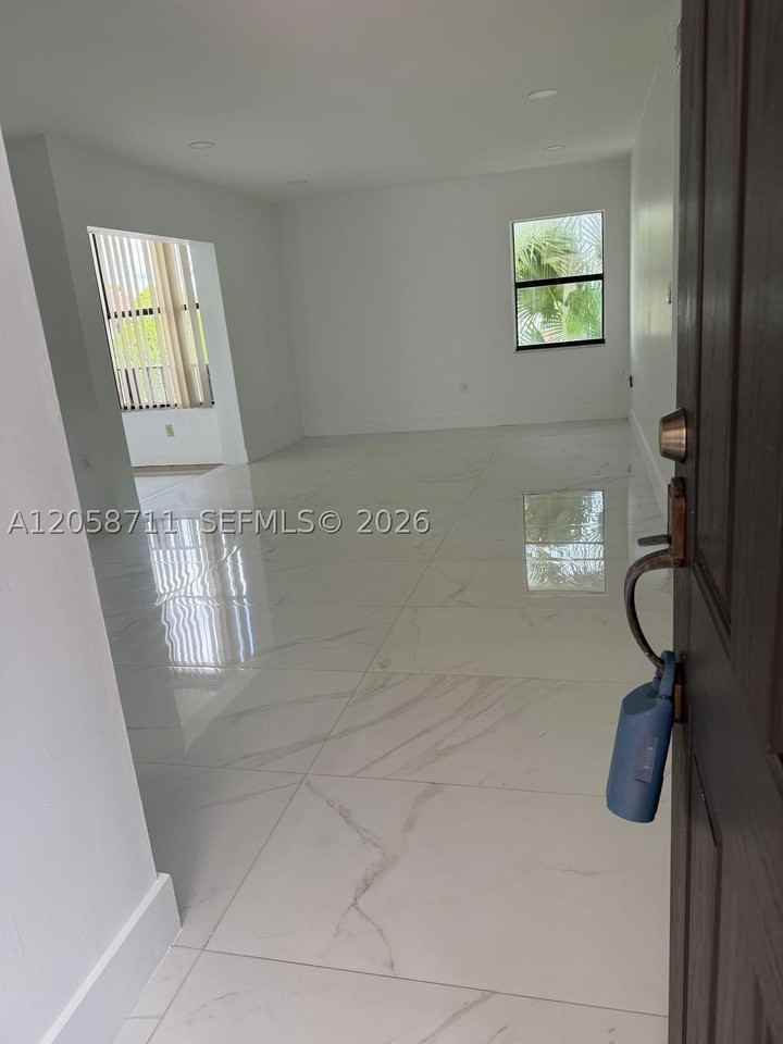 10875 Nw 7th St #23-36 - Photo 2 of 12