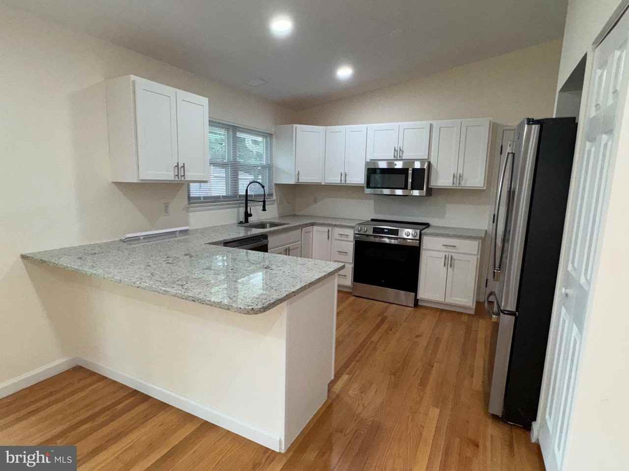 8327 Scotts Level Rd - Photo 5 of 23