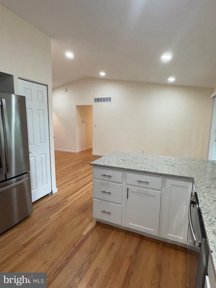8327 Scotts Level Rd - Photo 7 of 23