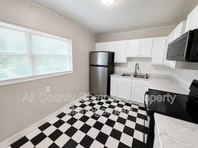 10415 Briarcliff Rd E - Photo 2 of 8
