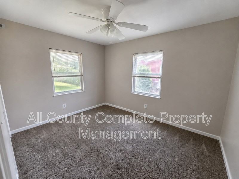 10415 Briarcliff Rd E - Photo 5 of 8