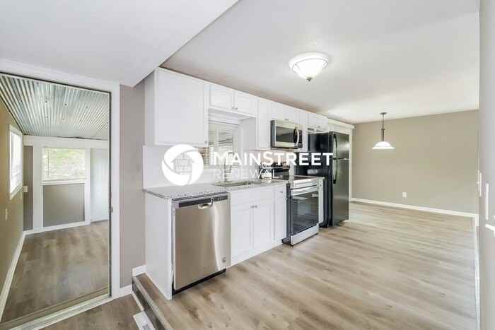 300 E 164th Ter - Photo 6 of 17