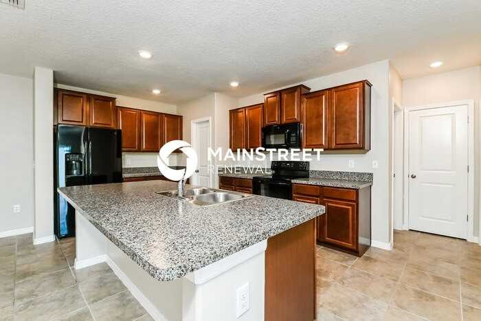 11411 Sage Canyon Dr - Photo 4 of 16