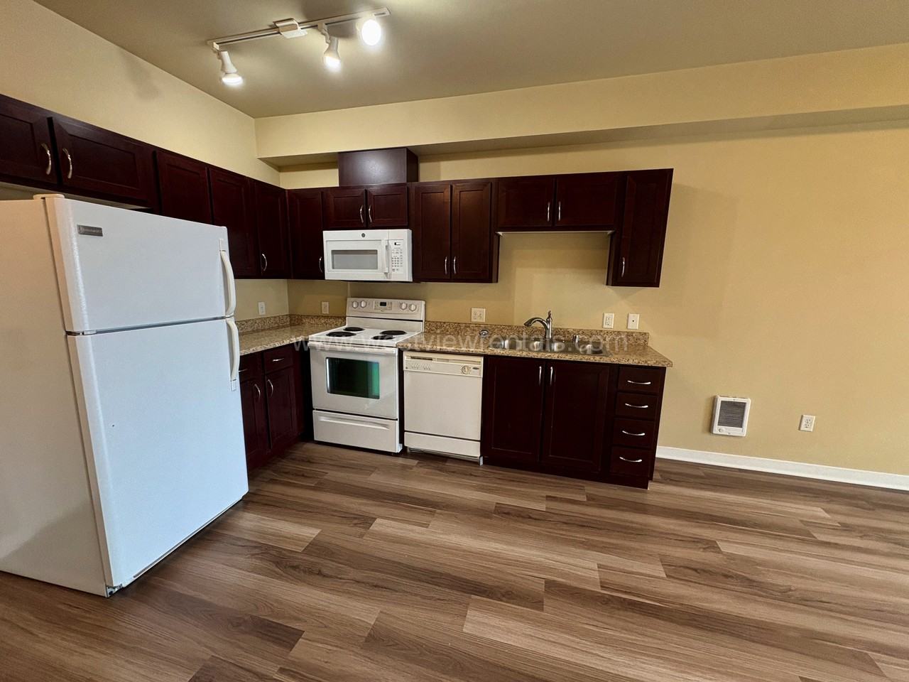 200 E. Maple Street - Now Leasing! - Photo 3 of 30