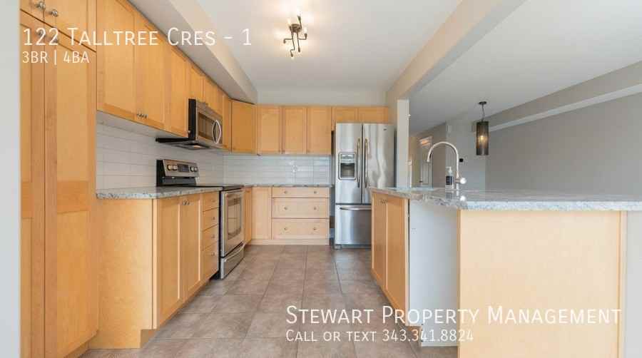 122 Talltree Cres #1 - Photo 5 of 26