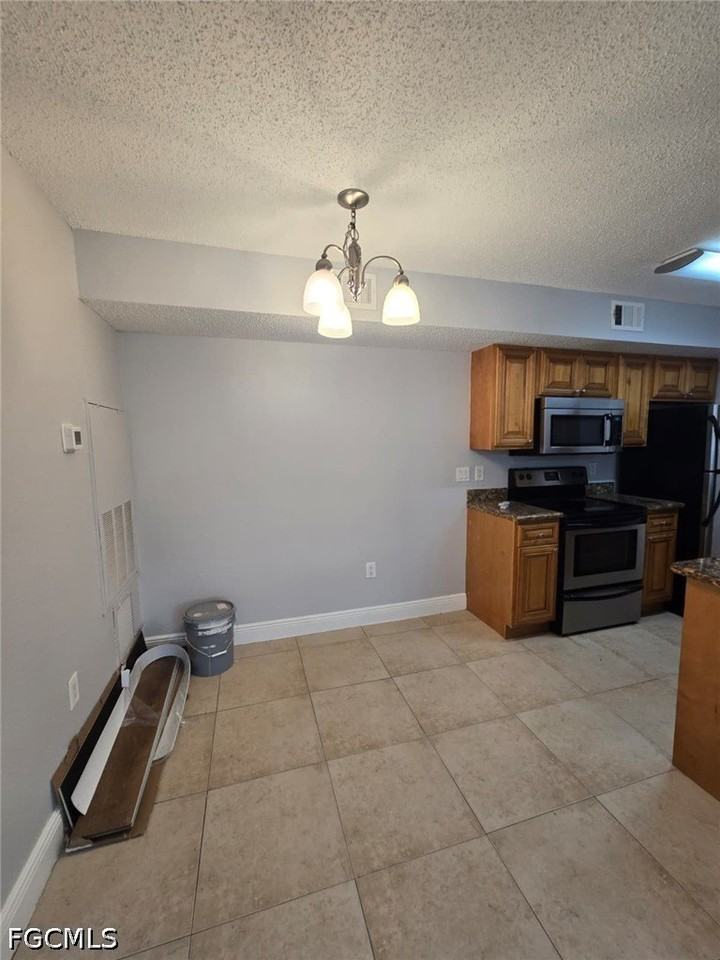 12591 Equestrian Cir #1203 - Photo 5 of 16