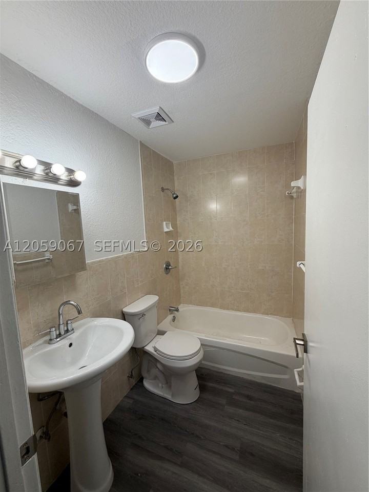 590 Nw 58th St - Photo 6 of 13