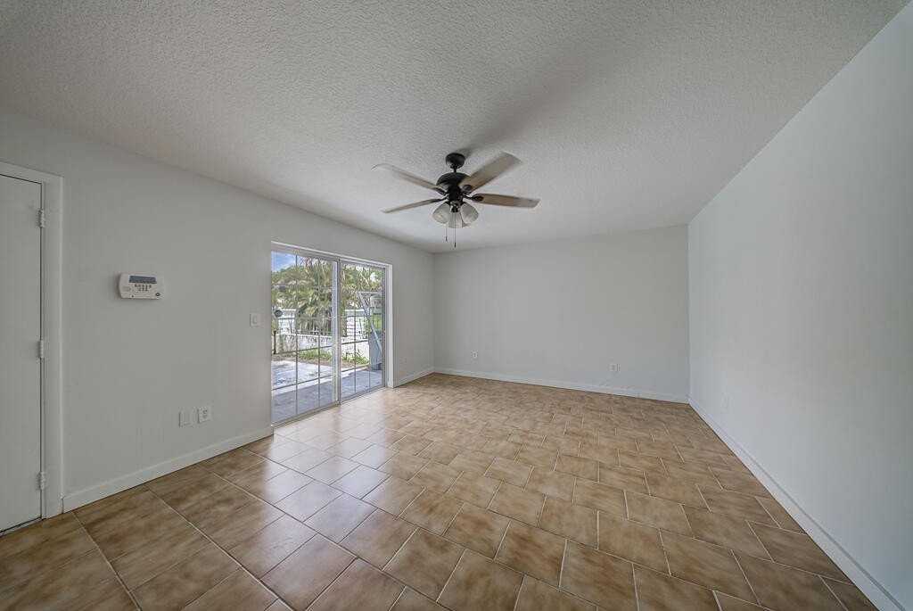 12037 Basin St N - Photo 5 of 23