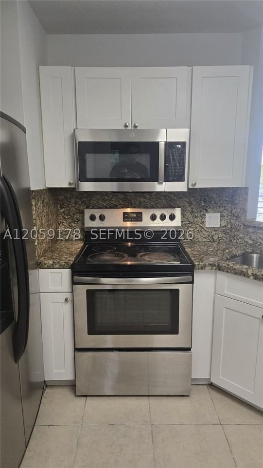 3409 Nw 44th St #201 - Photo 7 of 25