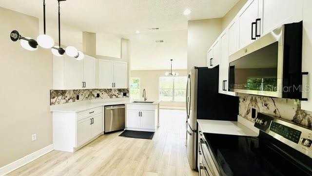 15613 Greater Groves Blvd - Photo 2 of 14