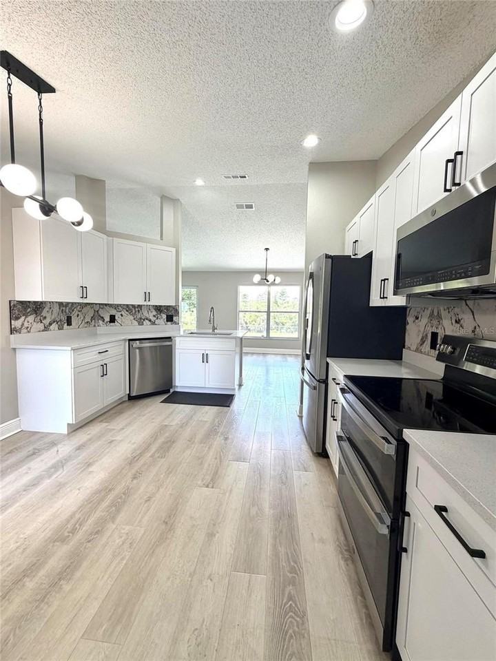 15613 Greater Groves Blvd - Photo 3 of 14