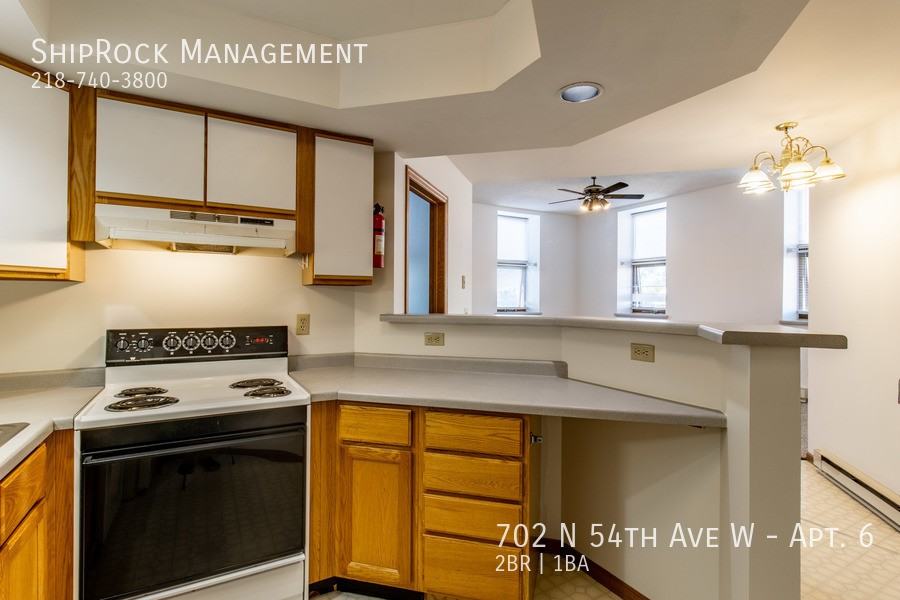 702 N 54th Ave W #6 - Photo 5 of 15