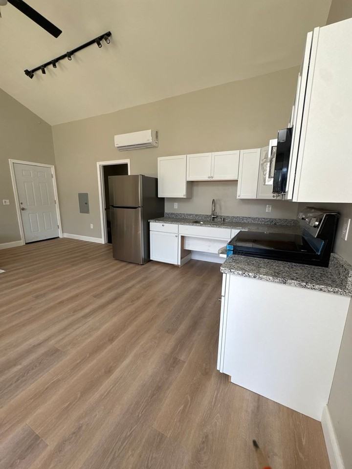 Newly Constructed Building featuring 16 Modern Apartments - Photo 3 of 5