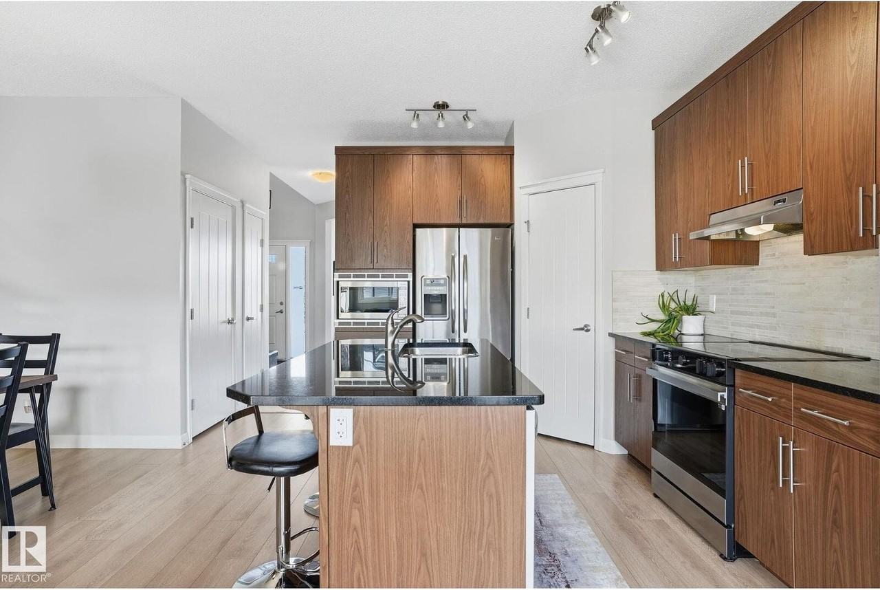 1148 Mcconachie Blvd Nw - Photo 5 of 17
