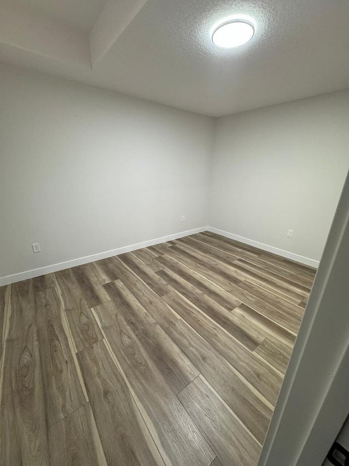 486 Wolf Willow Blvd Se - Photo 7 of 9