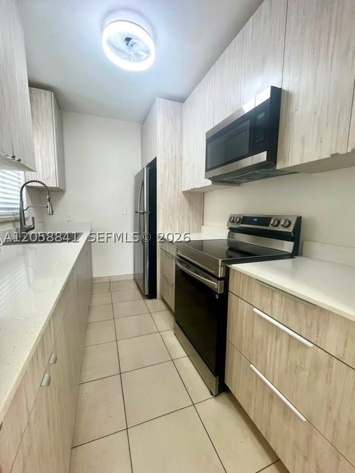 1679 Ne 176th St - Photo 2 of 20