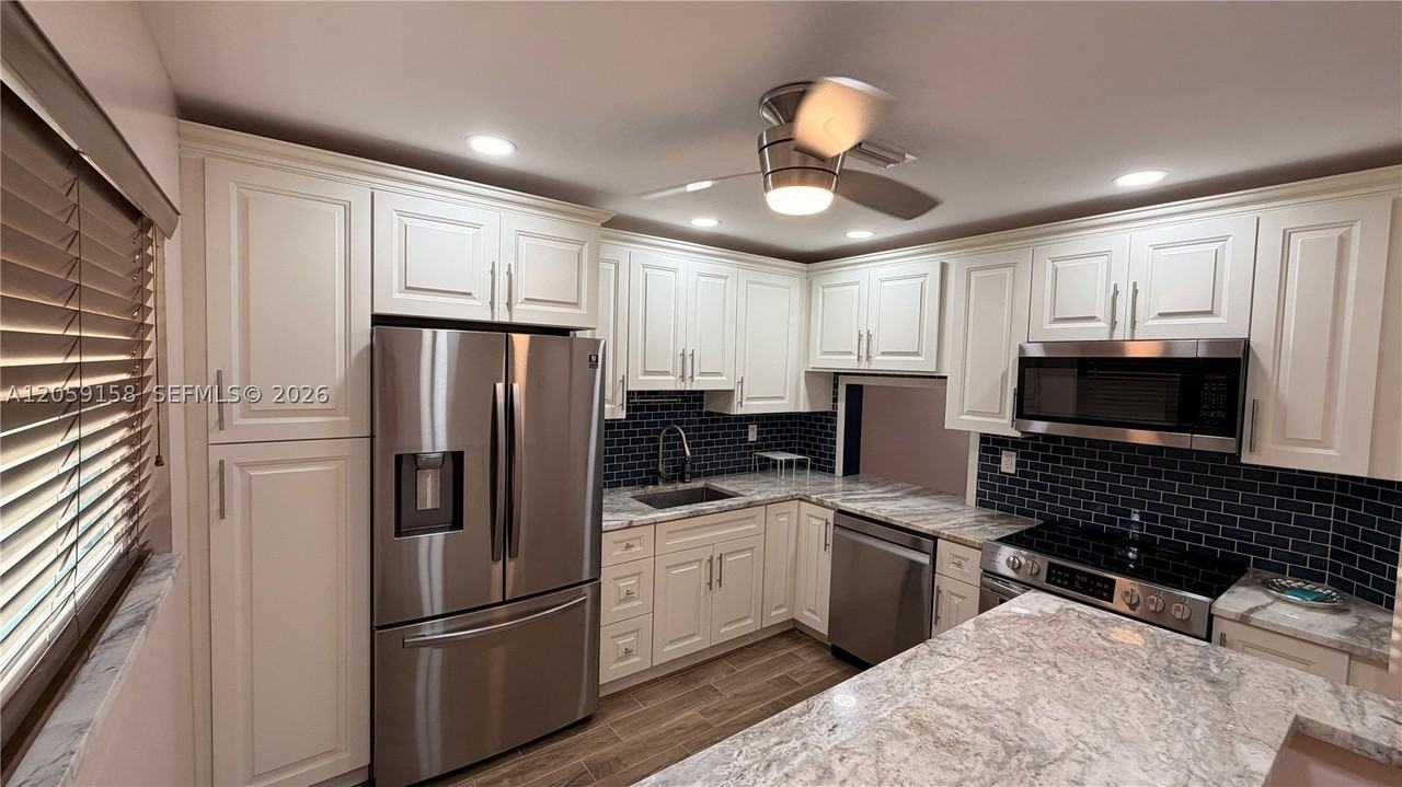 6090 N Sabal Palm Blvd #311 - Photo 5 of 48