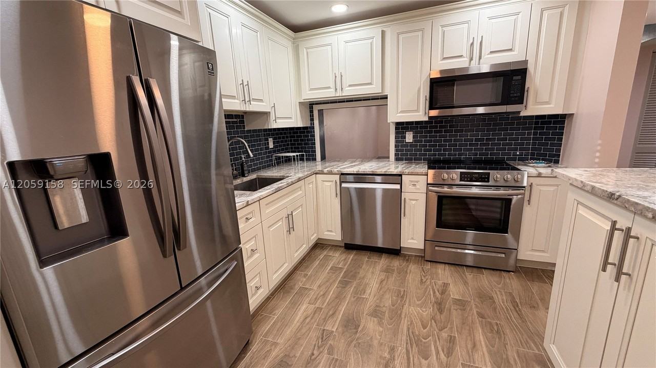 6090 N Sabal Palm Blvd #311 - Photo 6 of 48
