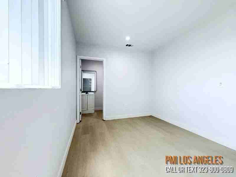 206 1/2 E 87th St - Photo 2 of 15