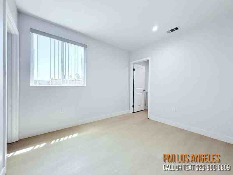 206 1/2 E 87th St - Photo 3 of 15