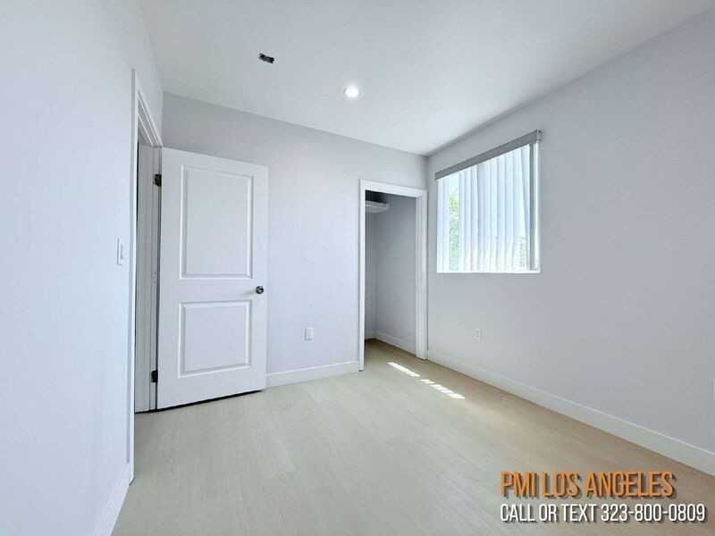 206 1/2 E 87th St - Photo 5 of 15