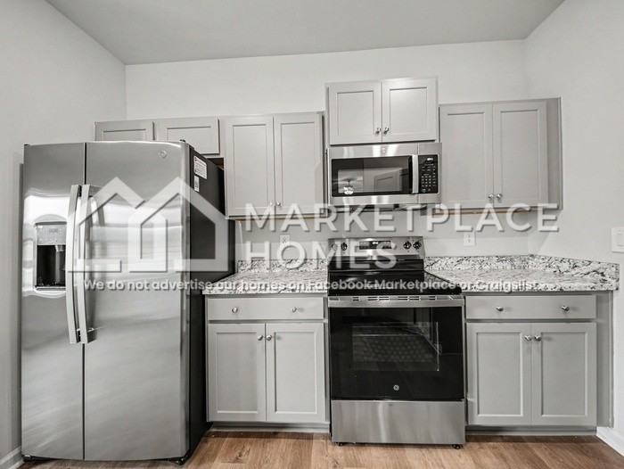 1728 Amber Ave Se - Photo 7 of 23