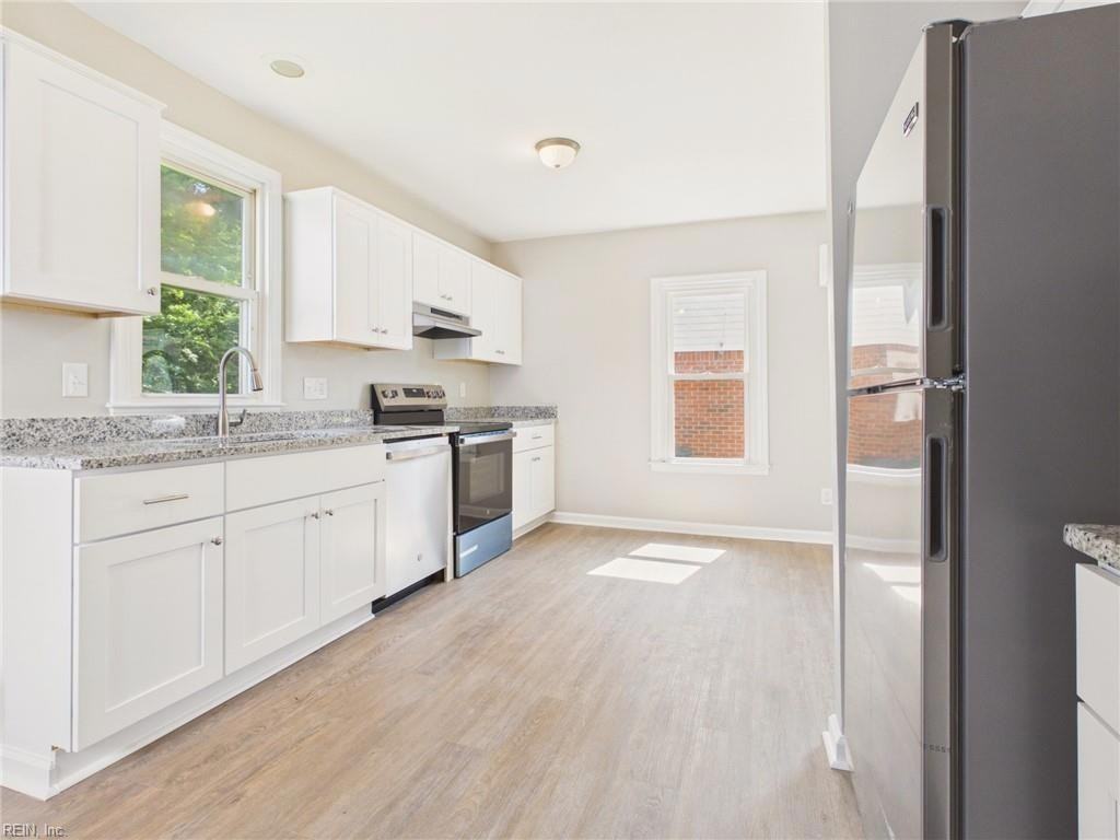 1442 W 41st St #1 - Photo 5 of 13