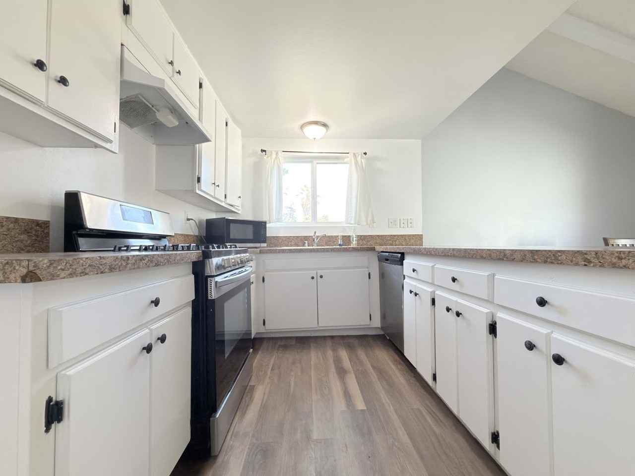 9845 Hayvenhurst Ave - Photo 6 of 24